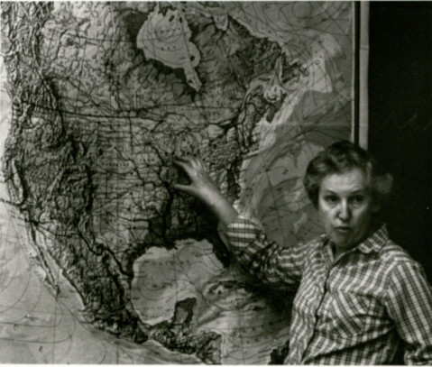 Dr. Patricia J. O'Brien points to a map while discussing the archaeology of central North America. (Image courtesy of Morse Department of Special Collections, Kansas State University Libraries)