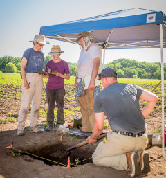 K-State students gaining instruction in excavation and documentation of finds during the 2016 Kansas Archaeological Field School. (Image courtesy of KSU Photo Services)